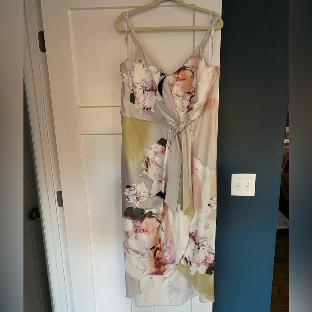 Beautiful water colored dress size 16 with an off-white  background color